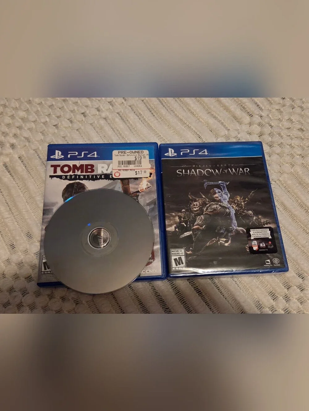 PS4 Game Lot — Blue Cases with Multi-Game Covers